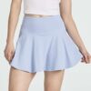 Real Essentials 4 Pack: Women's High Waisted Tennis Skirts Skater Skort Tummy Control Golf Shorts Pockets (Available in Plus)