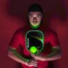 Reebok - LED Pickleball Set for 2, Includes 2 Fiberglass Paddles with 5" Cushion Grip and 2 Light-Up Balls, Perfect for Night Play (Red)